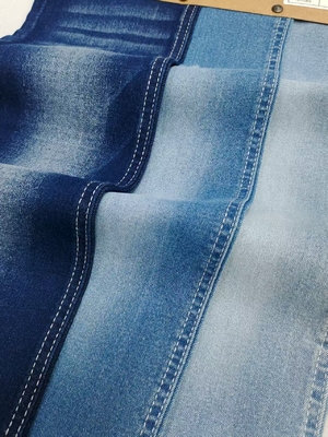 شراء لمسة ناعمة عالية Spandex Twill نمط 8.4 أوقية النسيج الجينم مع 12 * 21/70OE البناء للجينات online manufacture