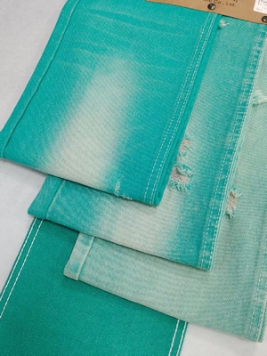 شراء Fancy APPLE GREEN Color Left Twill Style 10.6oz Denim Fabric With 10*7 Construction  JSD3023FG For Jeans online manufacture